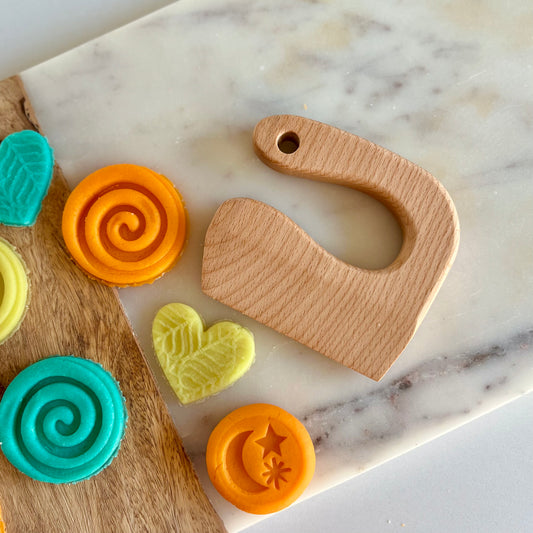 Wooden play dough cutter